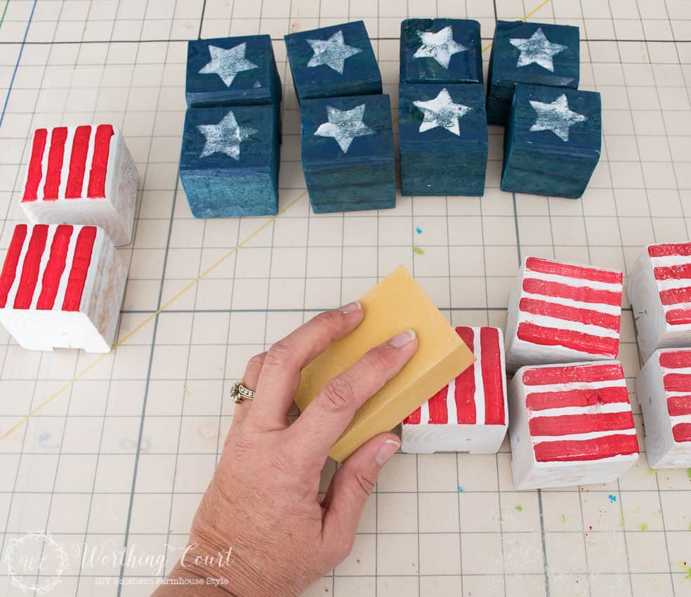 An easy and fun patriotic craft for Memorial Day, Flag Day and July 4th. How to create a vintage Americana look flag by painted wood blocks. Even kids would love to take apart and put the USA flag back together.