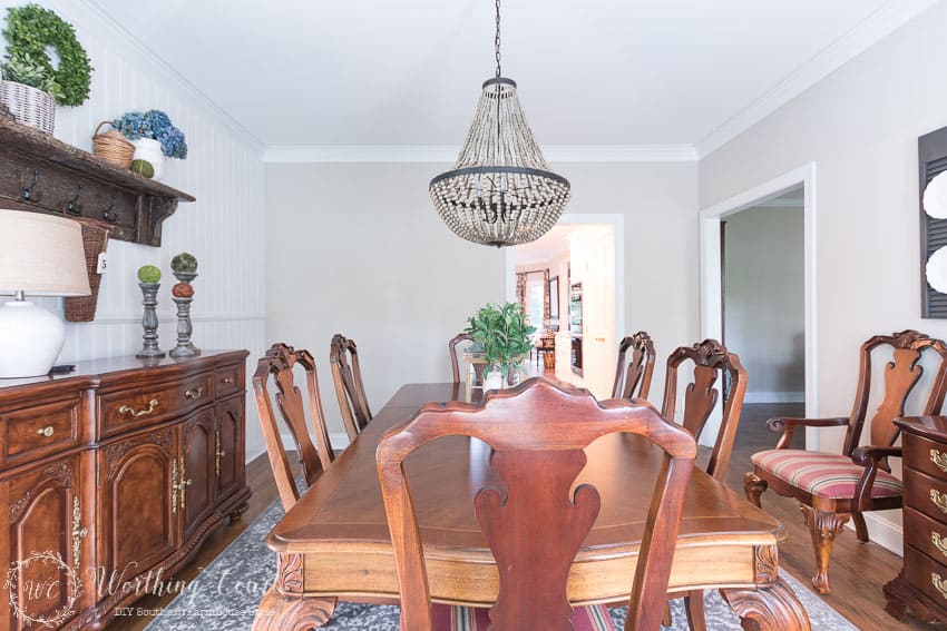 Part of adding farmhouse style to my dining room was making a decision on what to do with this wall. A diy plate rack or gallery of botanical prints?