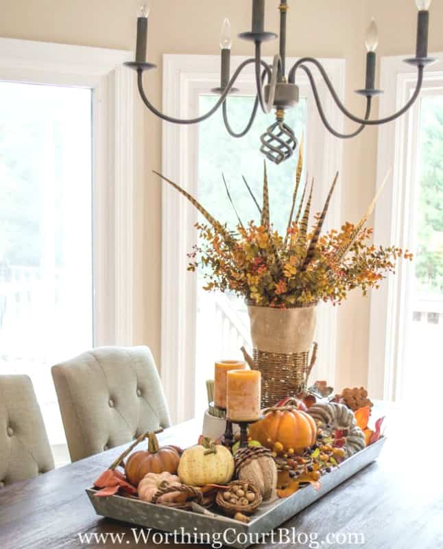 When figuring out how to make a centerpiece, consider adding a statement piece an unexpected place. #falldecor #tips #centerpiece #howto || Worthing Court