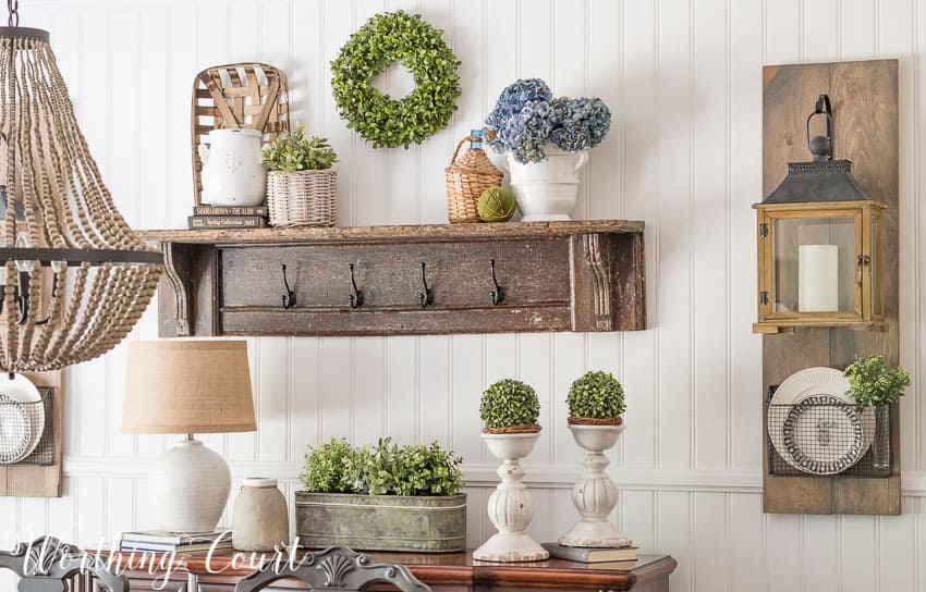 Farmhouse Dining Room Makeover - easy planked wall, diy hanging lantern display, vintage mantel turned into a shelf and pretty farmhouse vignettes