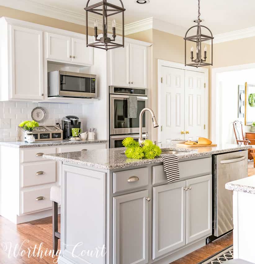 http://www.worthingcourtblog.com/wp-content/uploads/2016/08/White-Farmhouse-Kitchen-With-A-Gray-Island.jpg