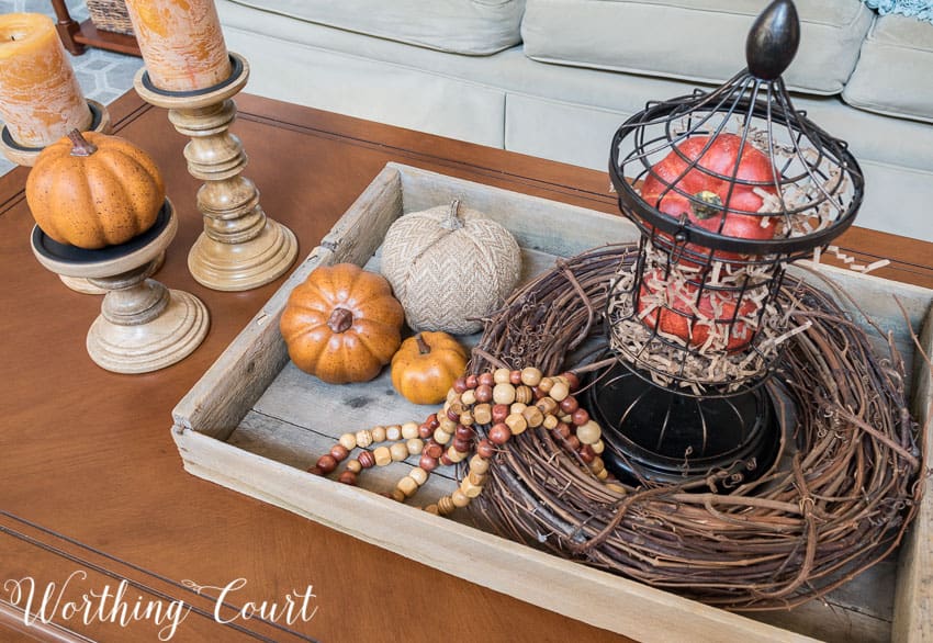 Fall coffee table vignette in an old planter's tray || Worthing Court