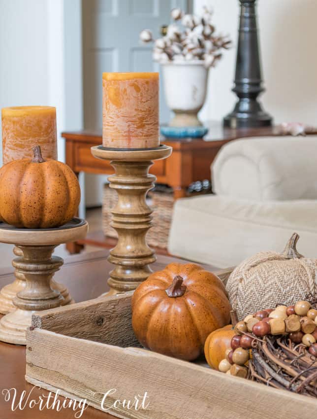 Fall vignette using an old planter's tray and candlesticks on a coffee table || Worthing Court