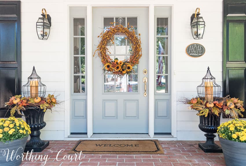 Farmhouse front entry with fall urns || Worthing Court