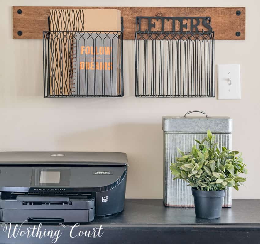 Hanging baskets for mail storage || Worthing Court