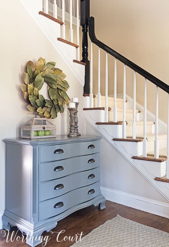 Traditional cherry chest painted gray with industrial hardware