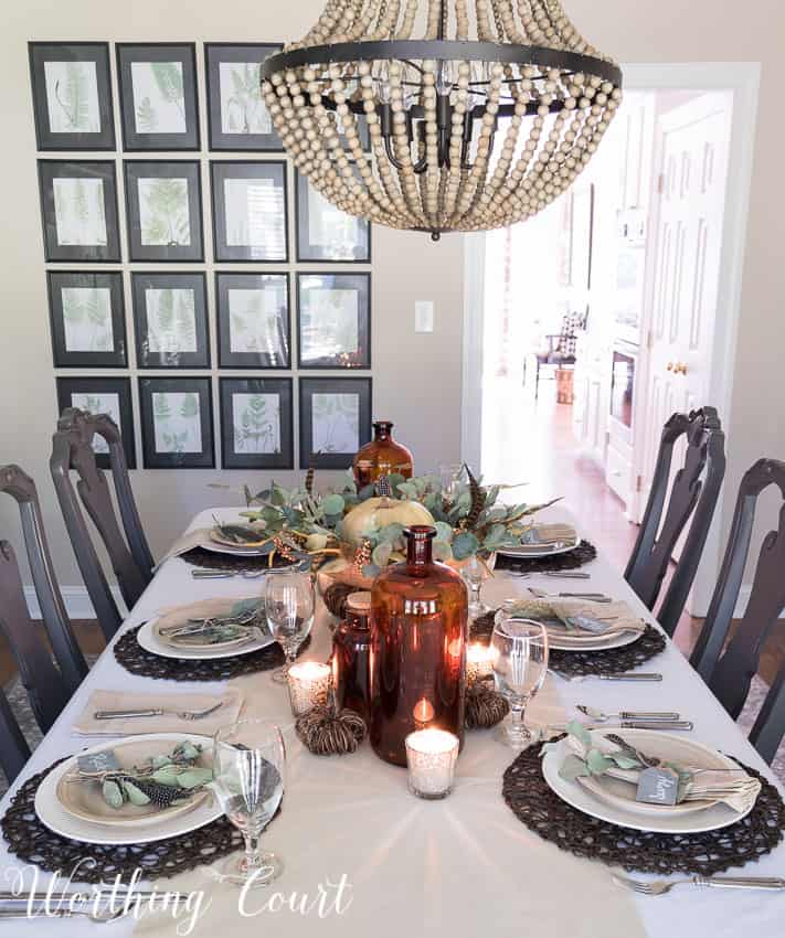 Mercury glass candle holders add a bit of sparkle to this Thanksgiving table || Worthing Court