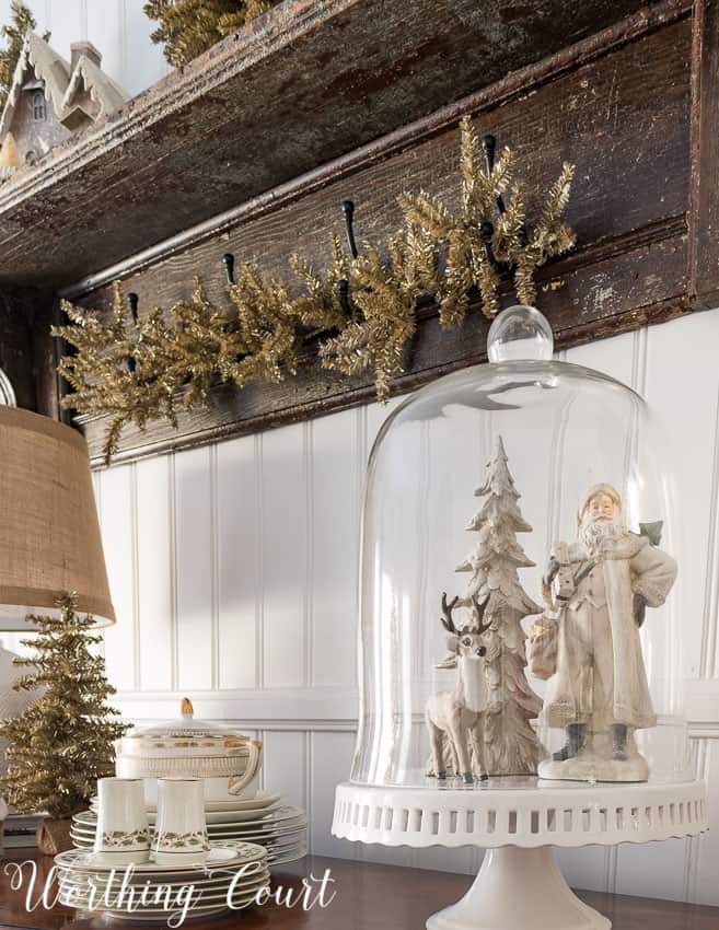 Christmas cloche display on a cake pedestal || Worthing Court