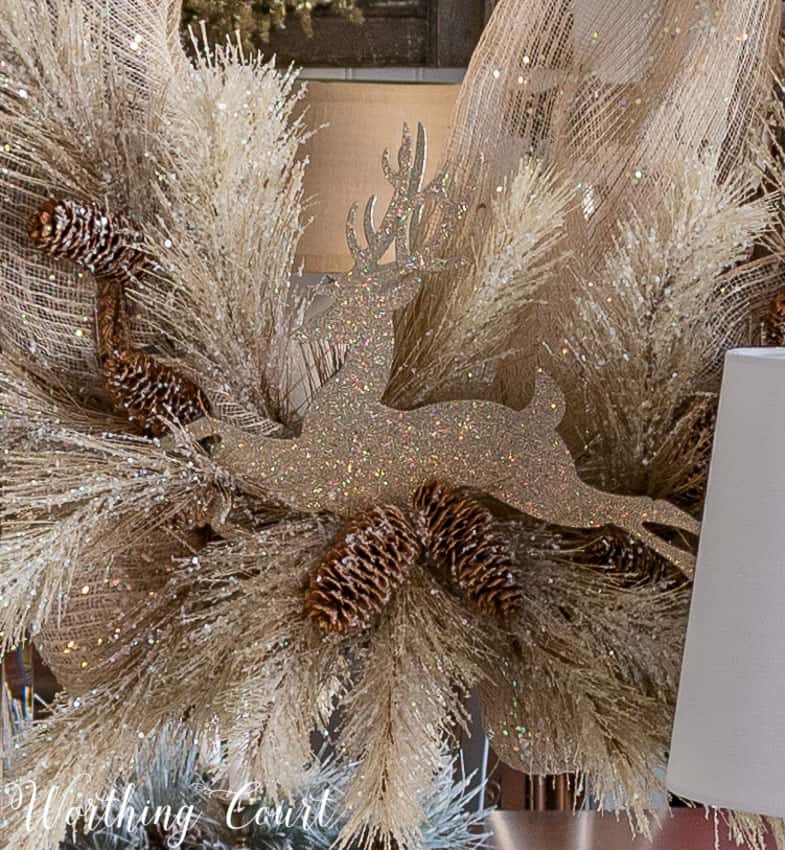 glittered reindeer and frosted natural colored faux pine branches on a diy Christmas wreath || Worthing Court