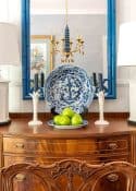 dining room with traditional brown furniture and chinoiserie accessories