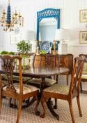 dining room with traditional brown furniture and chinoiserie accessories