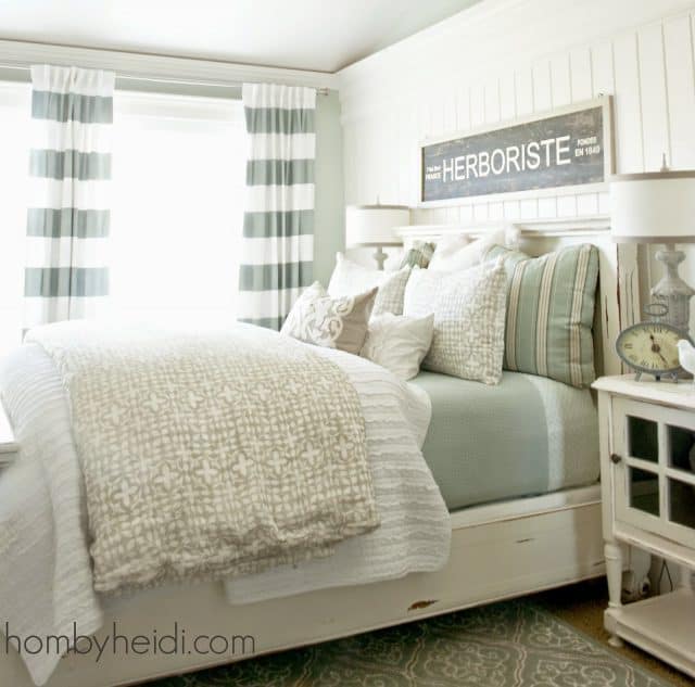 Soft green and neutral bedding.