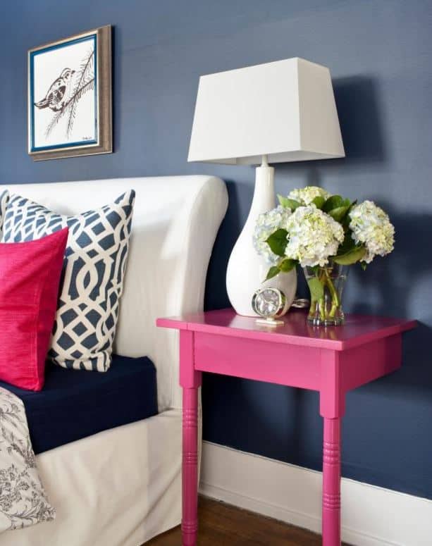 Tips for how to add style to a small bedroom. Don't have room for a full size end table? How about cutting a table in half (or even smaller) and attaching it to the wall with small angle irons.