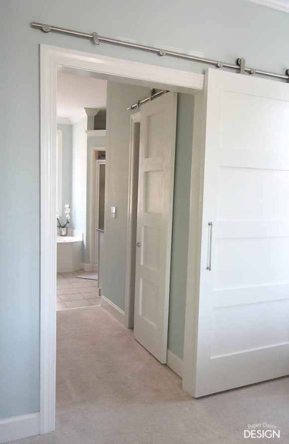 Loads of ideas for how to add style to a small bedroom. Swinging closet and bathroom doors take up a lot of floor space. Try a sliding door instead.