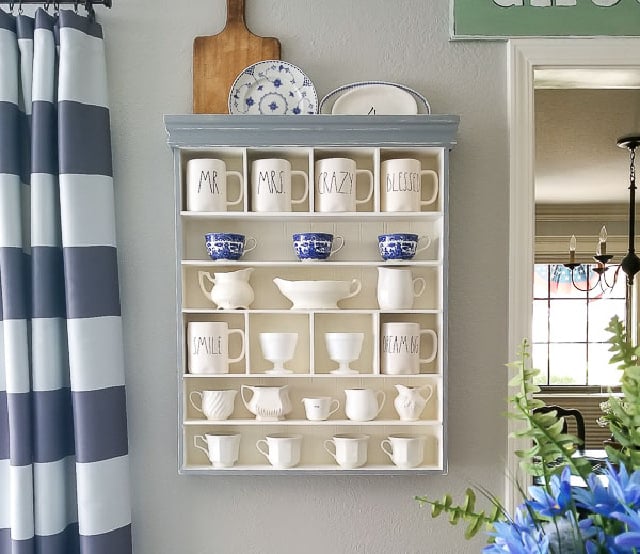 wall shelf with blue and white dishes