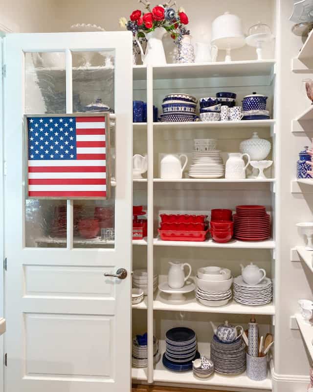 red white and blue dishes in a white pantry