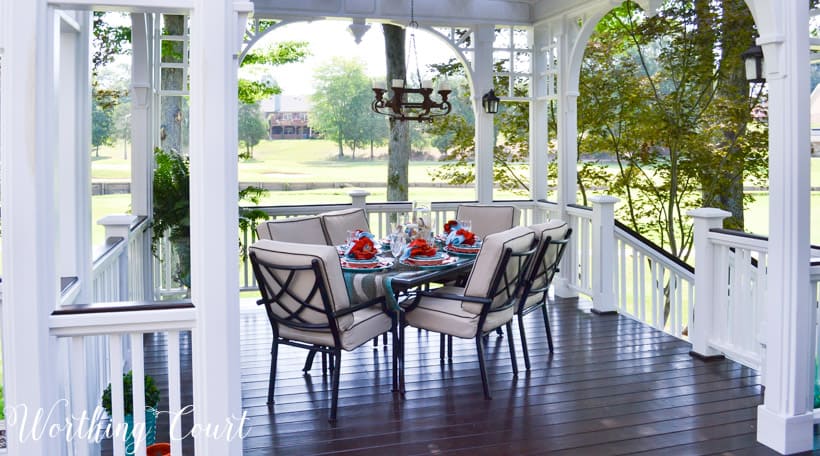 Orange and turquoise outdoor tablescape.