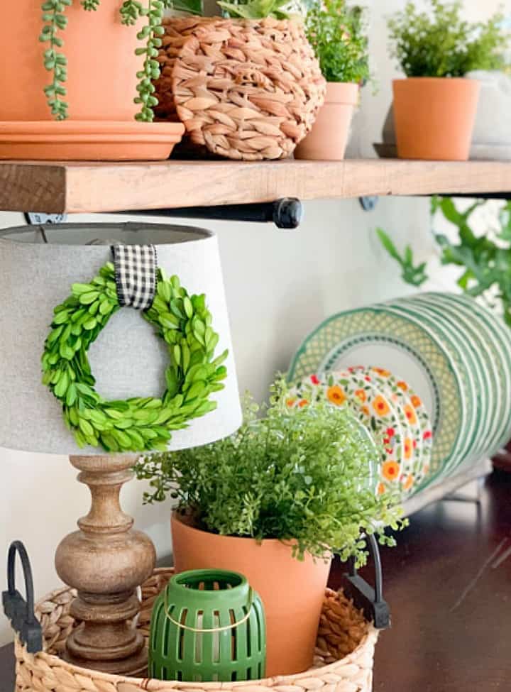 terra cotta pots and spring dishes on shelves