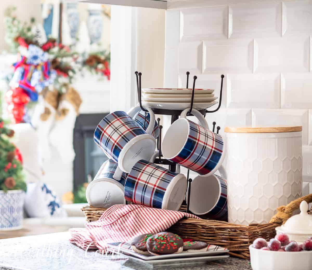 coffee tree with red, white and blue plaid mugs and red striped Christmas napkins