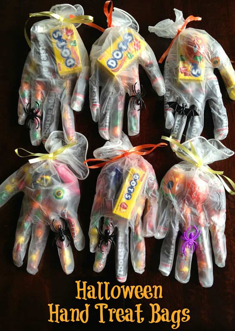 Creepy Halloween treat bags made with latex gloves.