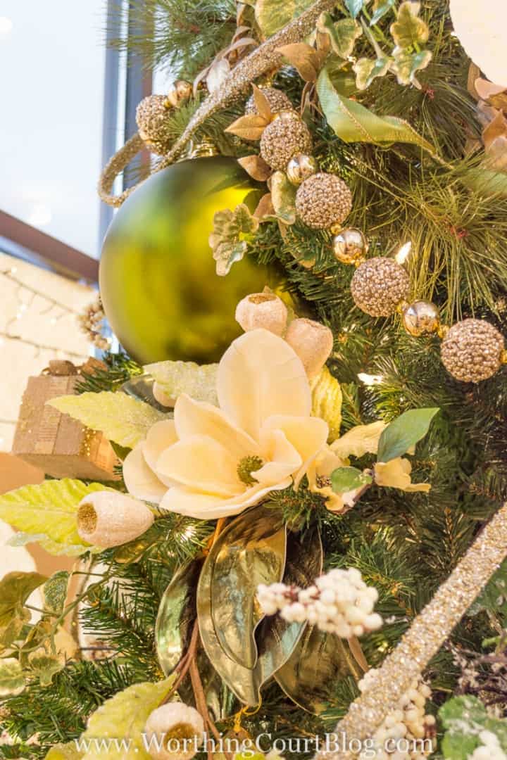 White, gold and yellow tree decorations.