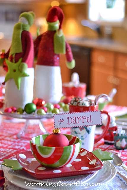 A place setting attached to a Christmas ornament.