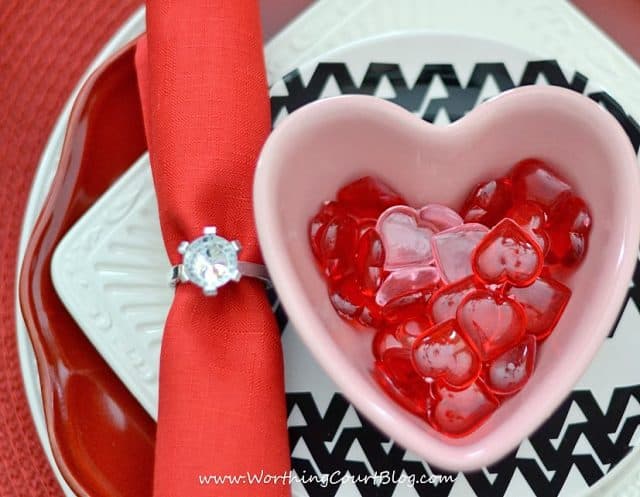 Stacked dishes in a Valentine's Day tablescape.