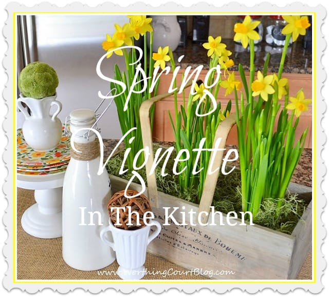 Easy and cheery 5 minute Spring vignette on a kitchen island with daffodils and other natural elements. 