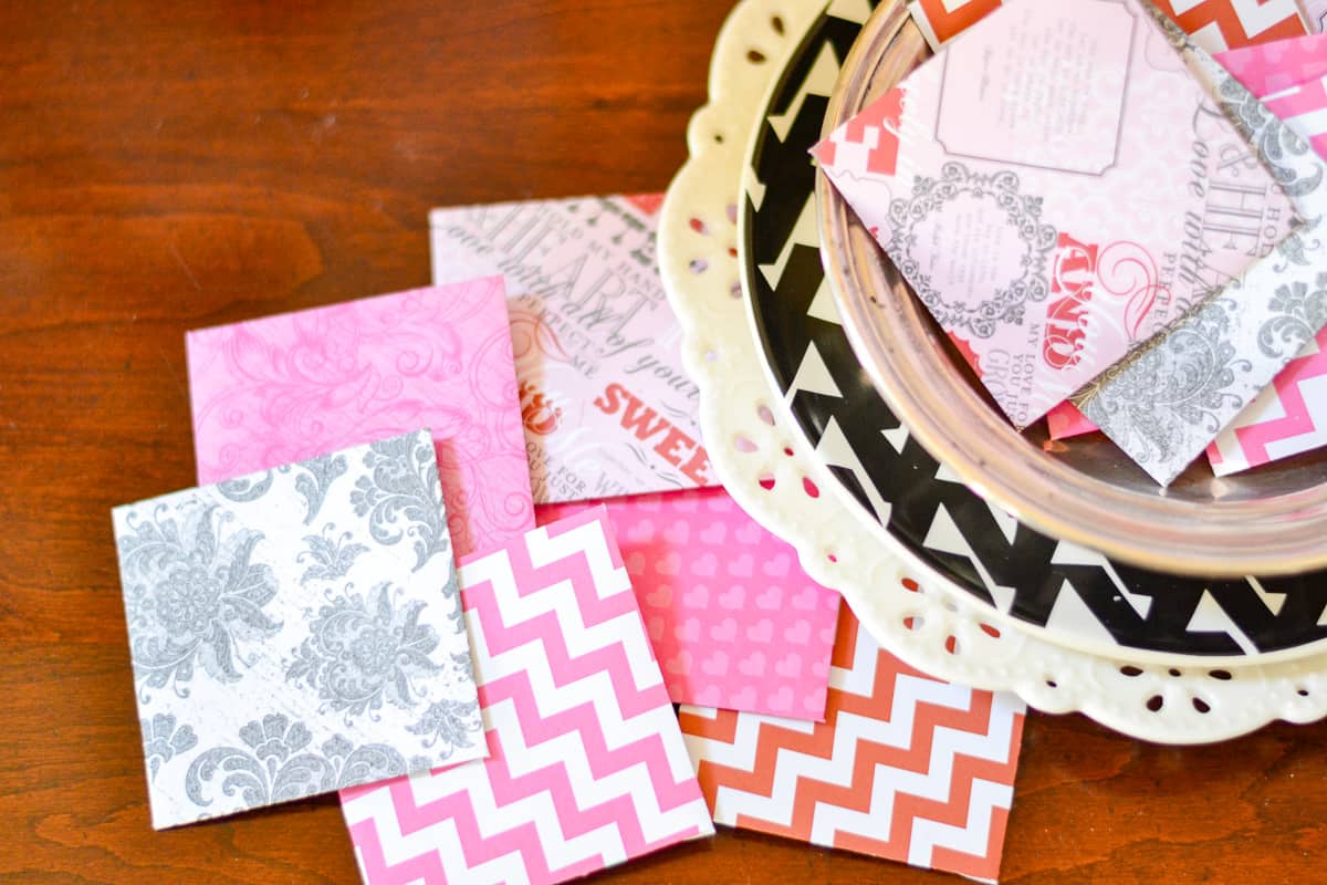 An assortment of mini Valentine's Day cards made with scrapbook paper