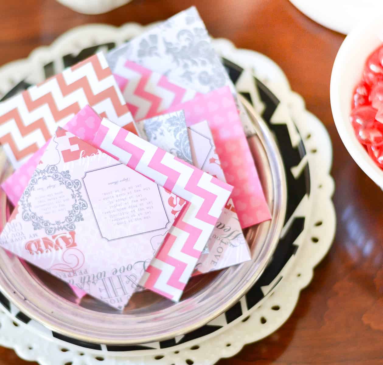 An assortment of mini Valentine's Day cards made with scrapbook paper