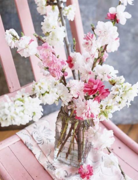 Blooming crabapple branches qualify as spring flowers too. Fill a grouping of jars with flowering branches to create a pretty spring vignette.