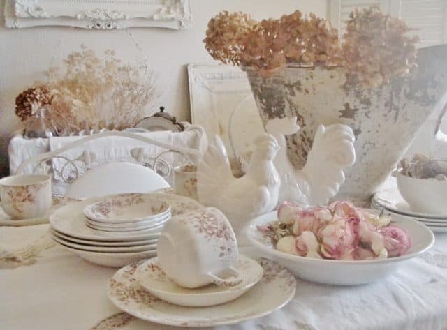 Pink and white teacups and saucers.