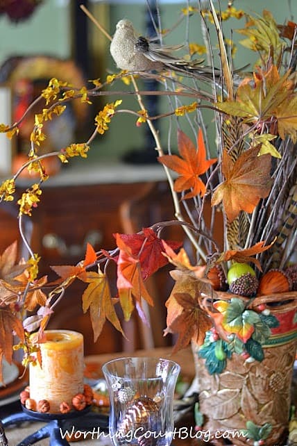 Sticks and twigs add lots of texture to this Thanksgiving centerpiece.