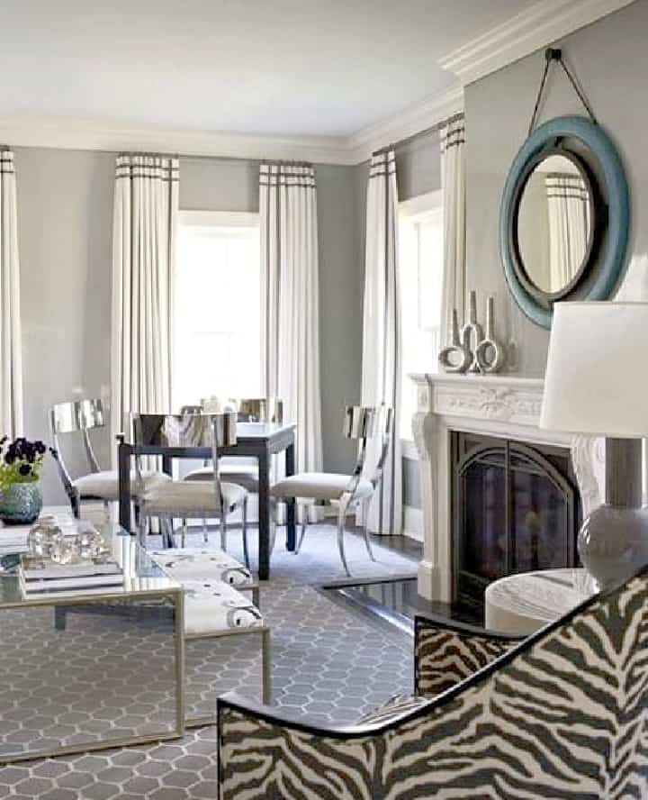 living room with gray walls and white curtains embellished with grosgrain ribbon