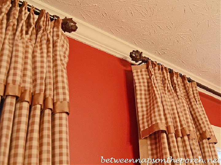 patterned curtains and valance embellished with grosgrain ribbon