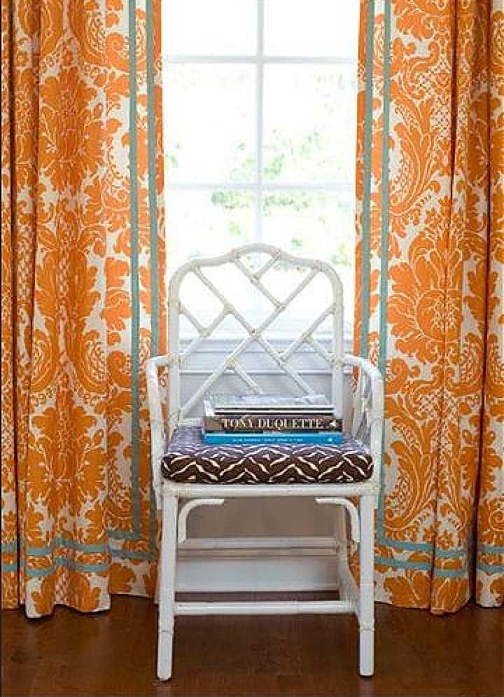 patterned curtains embellished with grosgrain ribbon