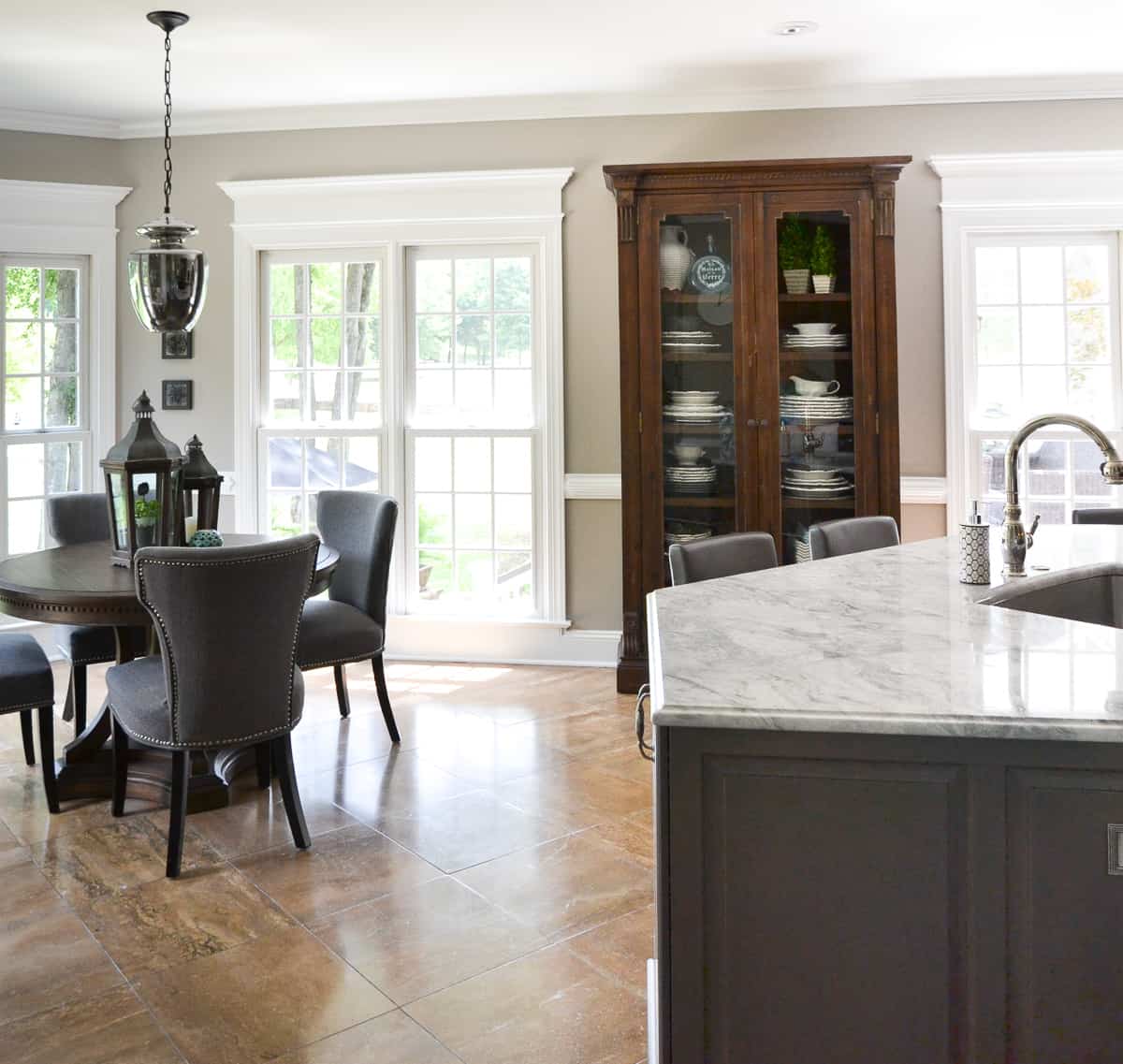 view looking into a breakfast nook in a bay window area of a kitchen