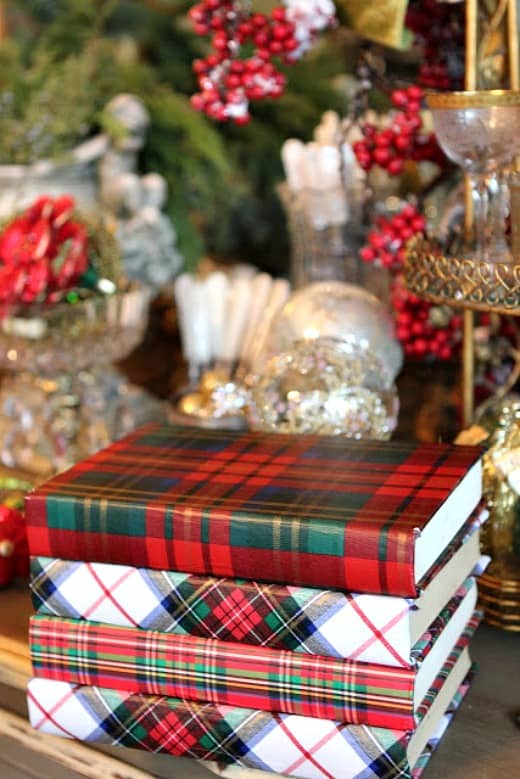 Wrap a few book with plaid wrapping paper to add a touch of plaid to any room.