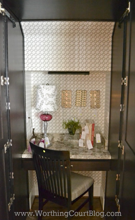 Tuck an office space into a kitchen by placing it behind cabinet doors. No more worries about having a mess desk!