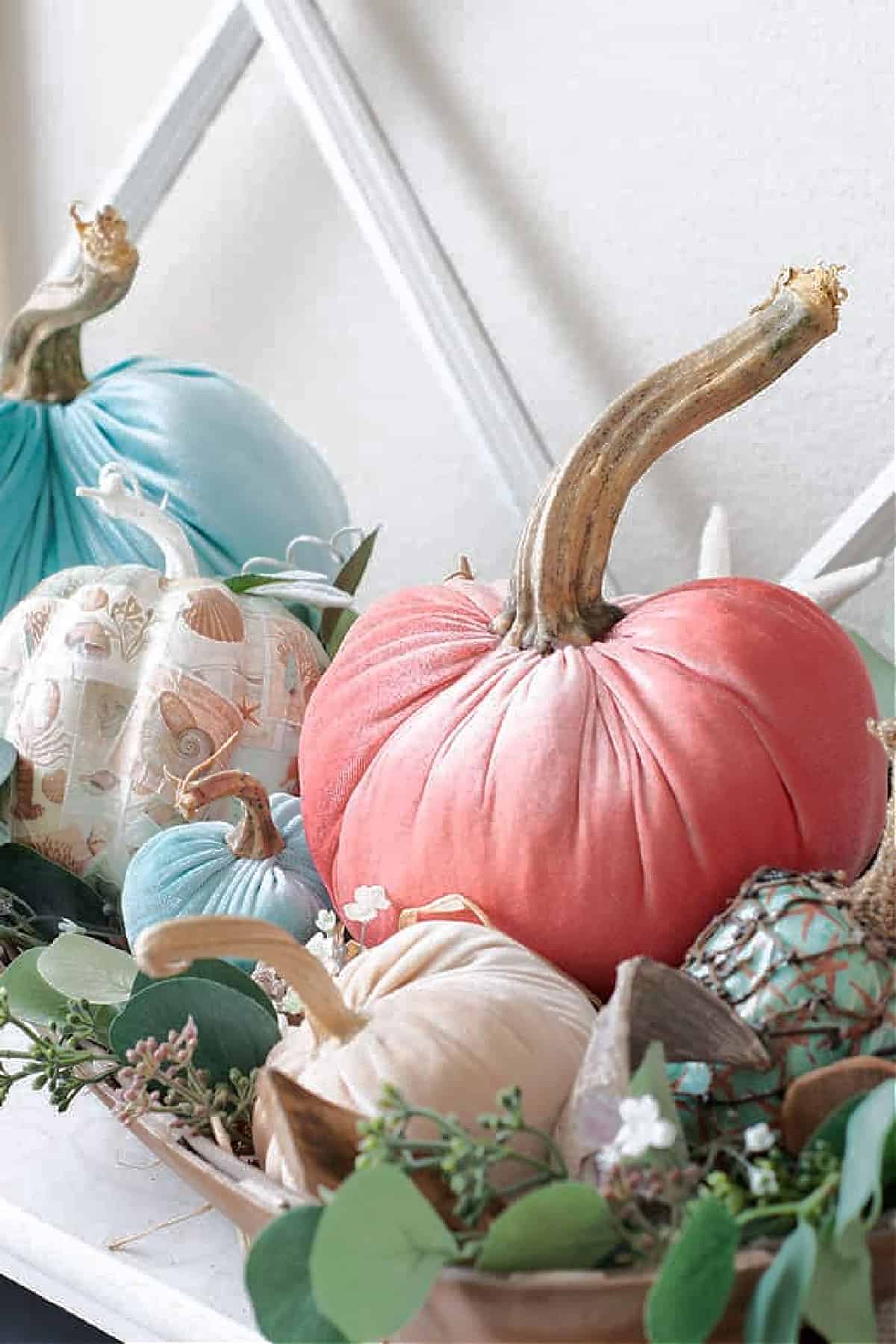 diy velvet pumpkins in different colors in an arrangement