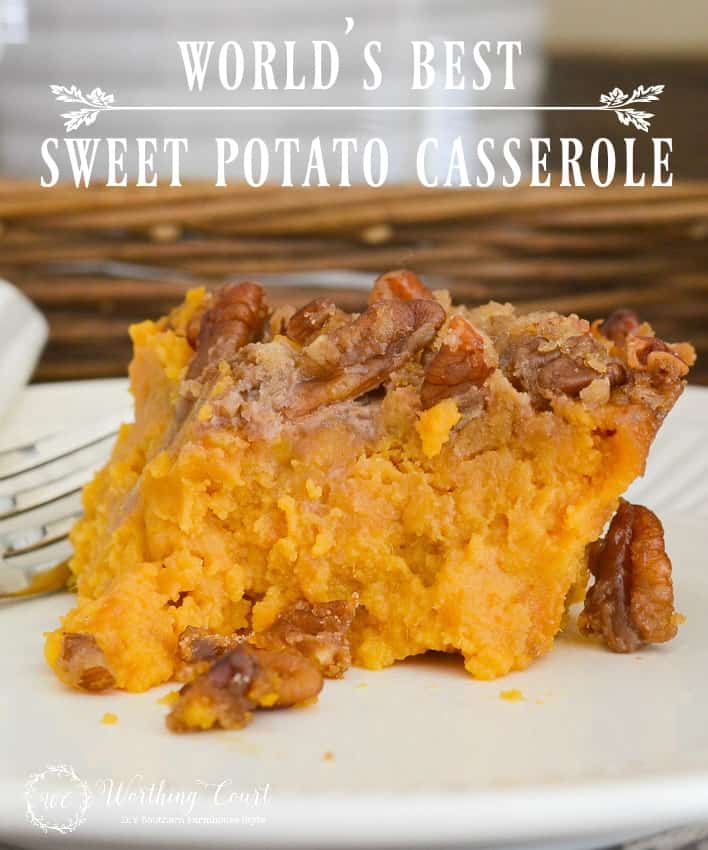 Sweet potato casserole on a white plate with fork.