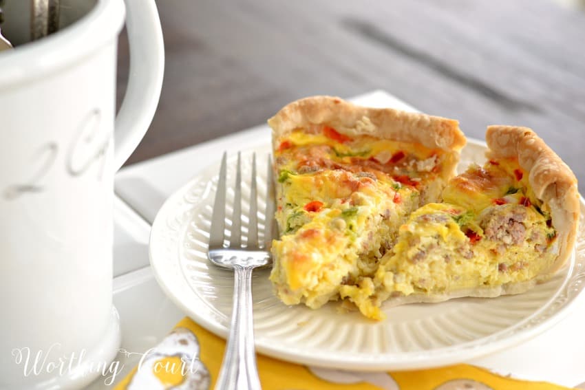 Christmas morning breakfast casserole with the fork on the plate.