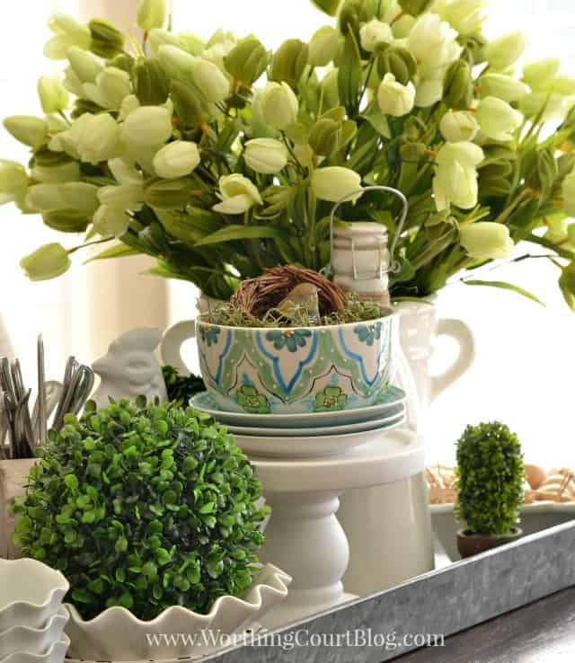 Spring Kitchen Centerpiece In A Galvanized Steel Tray on the table.