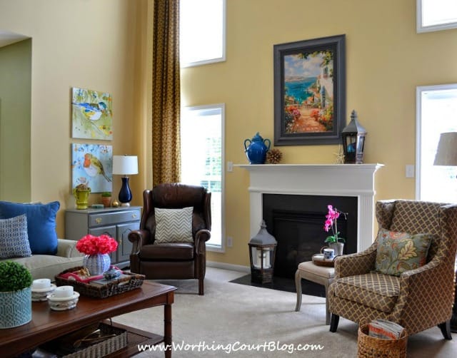 Family room with a fireplace and couch.