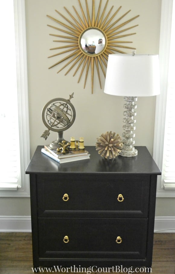 Office chest vignette and a small lamp on top.