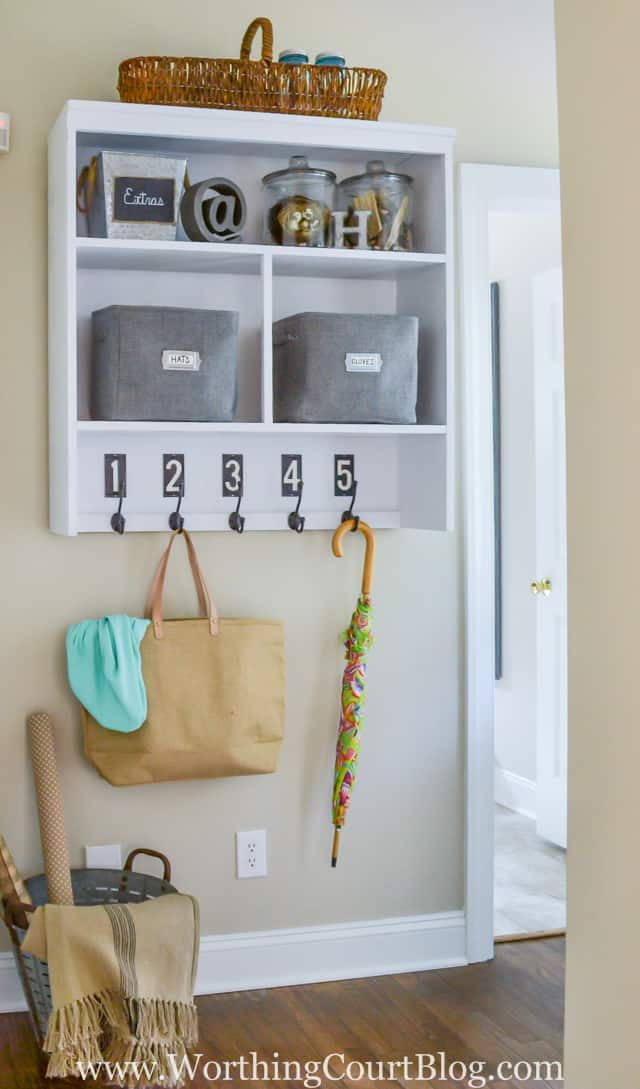 A repurposed hutch into a mudroom area.