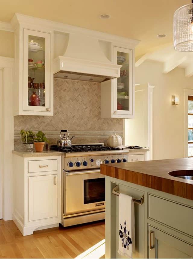 A white kitchen with a hint of yellow.