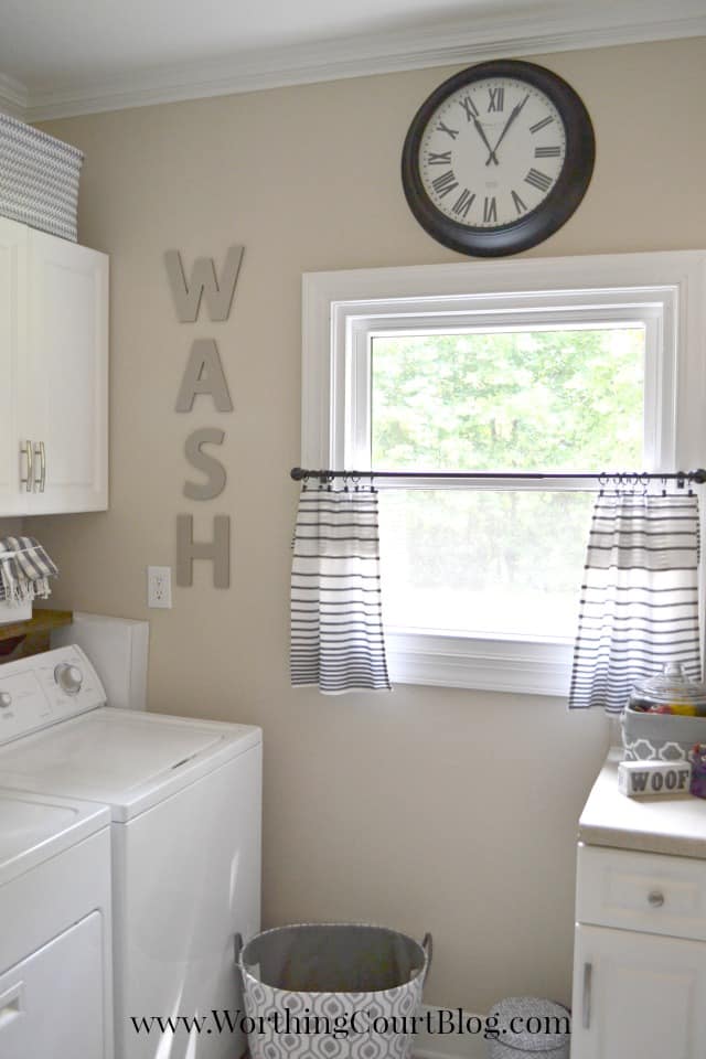 Laundry room with farmhouse and rustic touches
