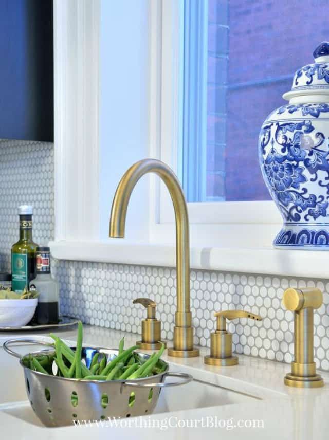 Penny tile backsplash in a French bistro inspired kitchen.