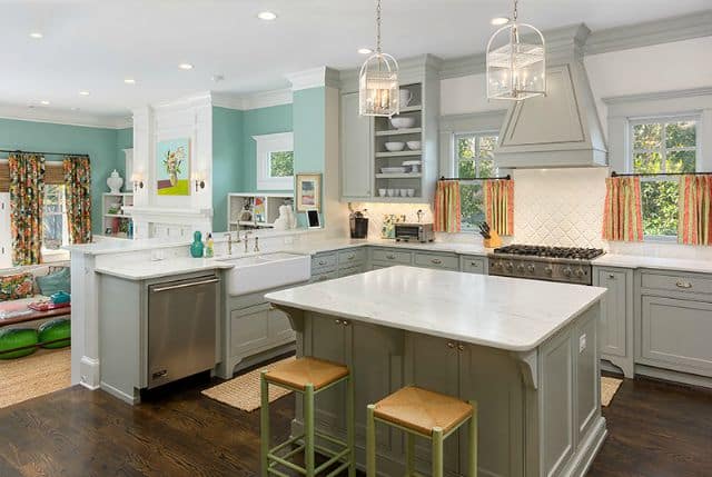 A white and light blue kitchen.